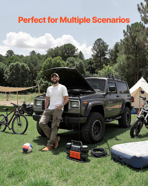 Heavy Duty Dual Cylinder Air Compressor Packed With 10.6 Cfm Quick Fill And Auto Shutoff on grass with a SUV, bicycle, and volleyball.