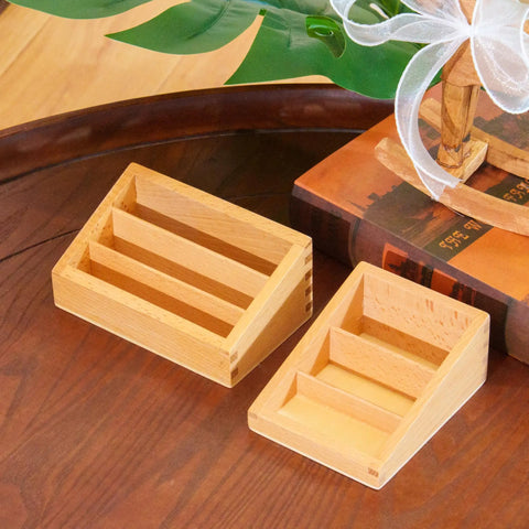 Big Beechwood Three Part Box For Montessori Language Cards on wooden table, featuring solid wood design with three compartments for sorting.