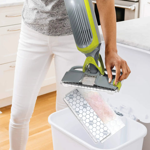 Disposable VACMOP Pad For All Floor Surfaces With Built In Dirt Chamber And Absorbent Mopping Layers White 10 Count Easy One Push Clean Up On Hard Floors, attached to mop head