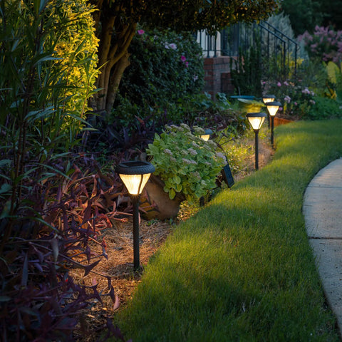 Outdoor Solar Pathway Lights 2-Pack, 2 Color LEDs Warm White And Bright White, black aluminum lamps illuminating garden pathway