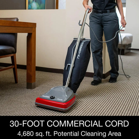 Tradition Upright Commercial Bagged Vacuum Cleaner Workhorse for Heavy Duty Carpet Cleaning in use on a hotel carpet