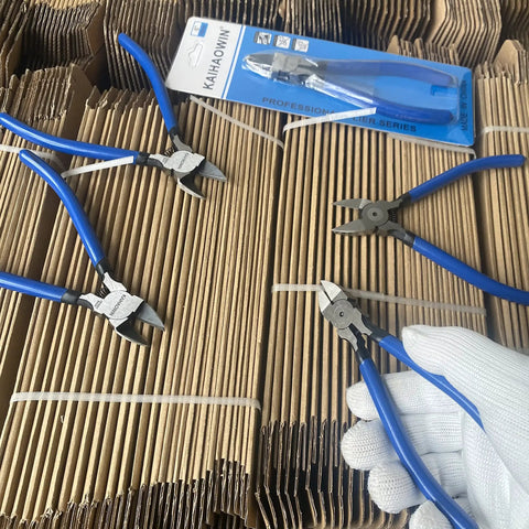 6 Inch Precision Wire Cutters For Jewelry Making, Ultra Sharp Flush Cutters, displayed on cardboard with a glove holding one pair