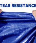 Heavy Duty 20x30 Ft Blue Tarp, 5 Mil Waterproof And UV Resistant, shown demonstrating tear resistance.