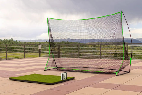 Portable Golf Sim Studio With Launch Monitor Real Time Swing Data Ball Speed Spin And Launch Angle setup on patio