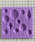 Silicone Hot Air Balloon Baking Molds For Cakes And Ornaments with detailed shapes and measuring grid backdrop