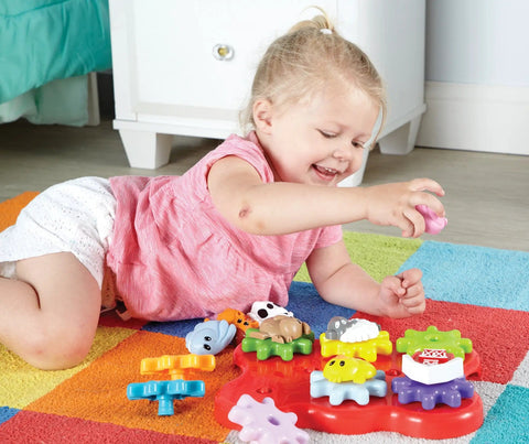 Toddler Sensory Gear Board Toy Set for Preschool STEM Fun Build and Spin Kid Friendly Barnyard Animals Hands On Learning for Fine Motor Skills Colors and Animal Recognition Gift for Boys and Girls with child playing.