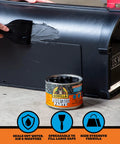 Hand applying Waterproof Patch And Seal Rubberized Sealant Paste Black 1Lb Can Heavy Duty Instantly Seals Water Air And Moisture