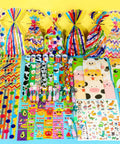 All In One Stationery Party Pack For Kids With 24 Goodie Bags Mini Notebooks Multicolor Pens Slap Bracelets Motivational Bookmarks Tattoos Classroom Gifts Class Rewards And Prizes displayed on table