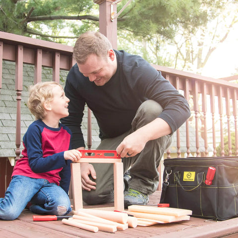 Kids Foam Wood Craft Kit 18 Piece Hands On Build Set For Boys And Girls Dope STEAM STEM Learning Toy Educational Construction Toys For Creative Play And Skill Building; father and child building a foam wood frame outdoors