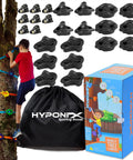 Young adventurer using Big Grip Tree Climbing Kit For Kids With 16 Jumbo Holds And 8 Ratchets, easy setup box and portable bag shown.