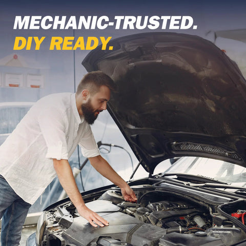 Mechanic using high-temp RTV gasket maker for engine repair.