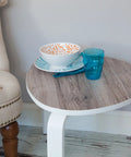 Side view of table with Weathered Oak Peel And Stick Decorative Self Adhesive Film Roll 17 Inch By 78 Inch 3 Pack With Applicator.