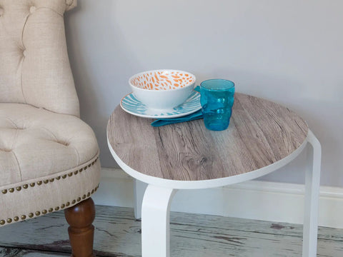 Side view of table with Weathered Oak Peel And Stick Decorative Self Adhesive Film Roll 17 Inch By 78 Inch 3 Pack With Applicator.