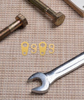 8 Piece Weight Driven Clock Chain Hook Set For Antique Grandfather Floor Clocks on woven surface with bolts and wrench