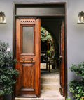 Outdoor Wall Mount Lantern Sconce In Oil Rubbed Bronze With Clear Seeded Glass Dusk To Dawn Sensor Weatherproof Exterior Porch Lights 2 Pack on stone wall flanking wooden entry door