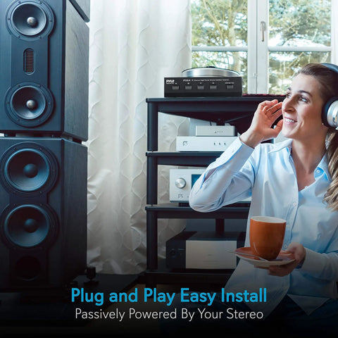 Woman listening to music with headphones beside Four Zone Speaker Switch Box For Multi Channel Stereo System A B C D Selector Hub