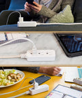3 Outlet Power Strip Surge Protector Indoor Extension Cord 10 Ft Braided Flat Cord 16 Gauge 245 Joules 3 Prong ETL Listed Brown ideal for home office setup, shown in use with various devices.