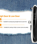 Side view of Handheld Heavy Duty Sewing Machine With Two Speeds Portable Mini Sewing Tool Kit showing gear settings and denim background