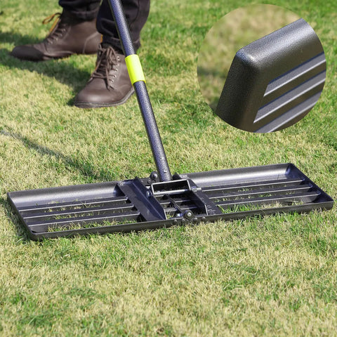 Heavy Duty Lawn Leveling Rake For Gardens And Yards, Level Dirt And Soil Like A Pro With A 65 Inch Steel Handle, 26 By 10 Ground Plate, Rust Resistant Stainless Steel Build For Easy, Even Ground Prep And Smoother Surfaces in use on grass, close-up of rake plate detail.