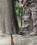 Person using Three Stage High Pressure Hand Pump For PCP Air Guns Stirrup Pump Filling Tool Up To 30 MPa in forest setting