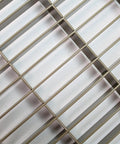 Close-up of 8 By 30 Floor Grille With Fixed Blades Brown Finish, Heavy Duty Reinforced Steel Floor Air Vent Cover with overlapping blades.