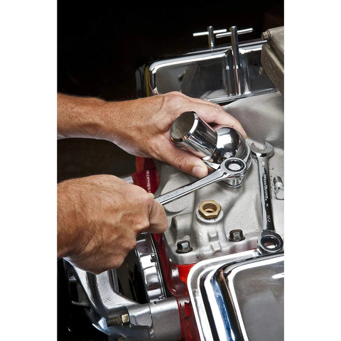 Hands using Ratcheting 12 Point Combination Wrench One And Thirteen Sixteenths Inch, 72 Tooth Box End on engine component.