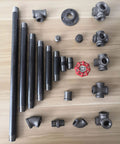 Assorted gray metal pipes and fittings with red valve for industrial shelving and DIY, Six Pack Pre Cut Half Inch By Six Inch Heavy Duty Gray Metal Pipe For Industrial Shelving And DIY Decor Fits Standard Half Inch Threaded Pipes And Fittings Vintage Steel Pipe.