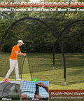 Person using Backyard Batting Cage 22x10x10 Ft Portable Baseball And Softball Cage with Zipper Door and sturdy steel frame.