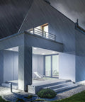 Modern house exterior lit by PAR38 LED Flood Light Bulb Mega Bright 5000 Lumens Daylight 5000K, outdoor damp rated.