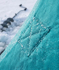 Close-up of the fabric detail of the Large Hexagonal Ice Fishing Tent With Chimney Vent For Hot Tent Camping Quick Snap Setup Insulated Winter Shelter Peacock Green.