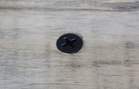 Hardcore Durability Size 8 By 1-1/4 Inch Black Xylan Coated Stainless Steel Flat Head Phillips Wood Screw on wood surface.