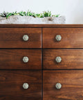 Dark wooden dresser with 12 Pack Ceramic Cabinet Knobs With Reversible Metal Backplates For Kitchen And Wardrobe Handmade Floral Knobs