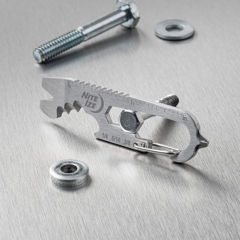 DoohicKey Keychain Multi Tool Stainless Steel 8 In 1 Bottle Opener on metal surface with screws and washers
