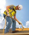 Worker using 50 Ft Vertical Lifeline Assembly with Adjustable Rope Grab and Shock Absorber on roof, OSHA compliant