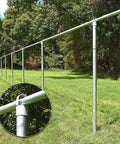 12 Pack Chain Link Fence Ring Caps For 2-3/8 Inch OD Posts And 2-1/2 Inch Aluminum Eye Top Rails With 1-5/8 Inch Loop Outdoor Fencing Repair Hardware For DIY Projects Durable No Brainer Install Replacement Parts shown installed on fence with trees in background.