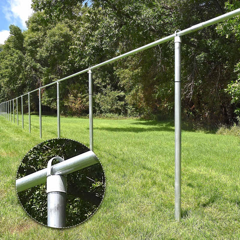 12 Pack Chain Link Fence Ring Caps For 2-3/8 Inch OD Posts And 2-1/2 Inch Aluminum Eye Top Rails With 1-5/8 Inch Loop Outdoor Fencing Repair Hardware For DIY Projects Durable No Brainer Install Replacement Parts shown installed on fence with trees in background.