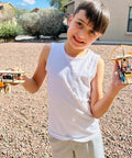 Child holding models from Solar Car STEM Kit For Kids Aged 8 9 10 12 14 Build Four Hands On Projects Like A Solar Car An Electric