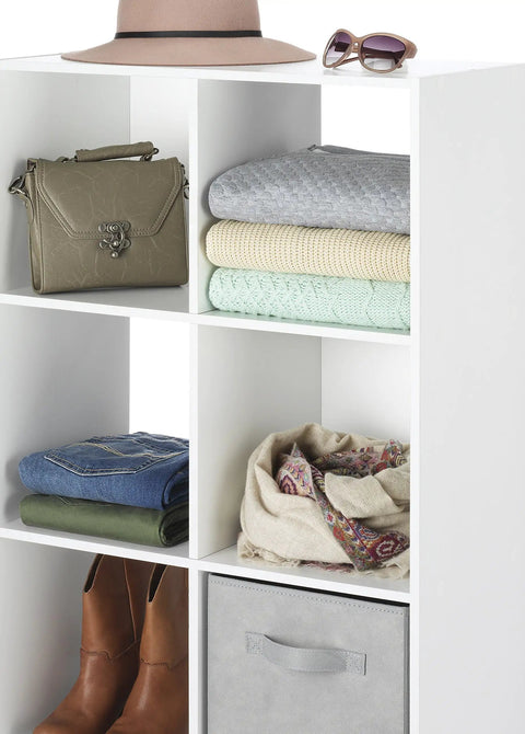 Six Cube Storage Organizer Bookcase with folded clothes, bag, and accessories on white MDF shelves for home use