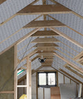 Attic interior with reflective aluminum radiant barrier sheets for Garage Door Insulation Kit With 16 Double Bubble Panels And 100 Adhesive Tape.