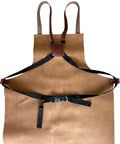 Leather Grill Master Apron With Cross Back Straps Heat Resistant Full Grain Leather For BBQ Woodworking Barber And Welding Adjustable From M To 2XL Unisex Brown showcasing front view with black straps.