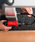 Cordless Electric Screwdriver Kit With Built In LED Light And 31 Pc Bit Set in use on furniture, showcasing flexibility and LED indicators.