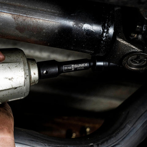 Mechanic using Limited Clearance 1/2 Inch Drive Socket Set, 12 Point, 9 Piece, Metric 8mm To 17mm on automotive part