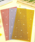 Three glitter acrylic sheets in red, silver, and gold; 6.3 x 11.4 in, 1/10 in thick.