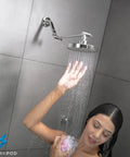 Person showering under an 11 Inch Solid Brass Shower Head Extension Arm With Flexible, Adjustable Height And Angle For Rain Showerheads, Universal One Half Inch Pipe Connection, Heavy Duty Lock, Luxury Polished Chrome Finish.