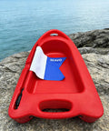 Spearfishing Float Boat With Carry Straps Foldable Flagpole And Compact Storage Red Buoy On Rocks Near Sea