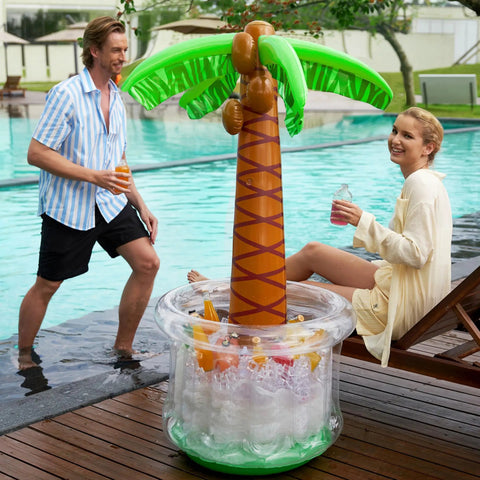 Inflatable Palm Tree Cooler, 60 Inch Tall, Beach Theme Pool Party Decor with ice and drinks near a poolside.