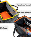 Open 20 Inch Electrician Tool Bag Pro Grade Beast Heavy Duty Tote With 32 Pockets and bright orange interior for easy access.