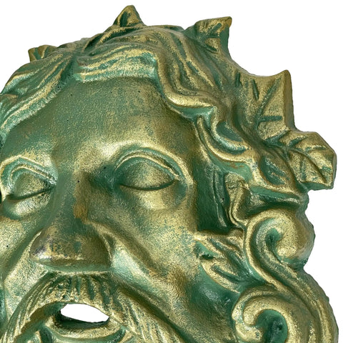 Heavy Duty Cast Iron Celtic Green Man Wall Plaque Sporting A Dead Cool Antiqued Verdigris Finish Standing Ten Inches Tall close-up of face detail.