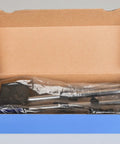 Front view: magnetic base with metal rods in plastic bag inside a blue box