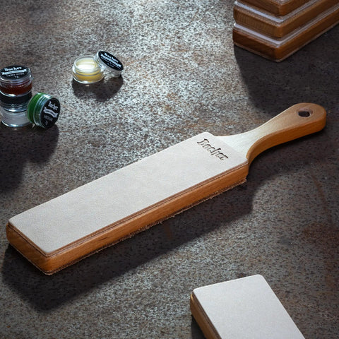 Pro Grade Leather Knife Strop With Double Sided Stropping Leather And Polishing Compound Handmade In Poland on table
